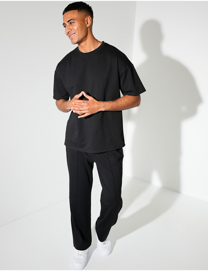 Ensemble uni pantalon à bande et t-shirt