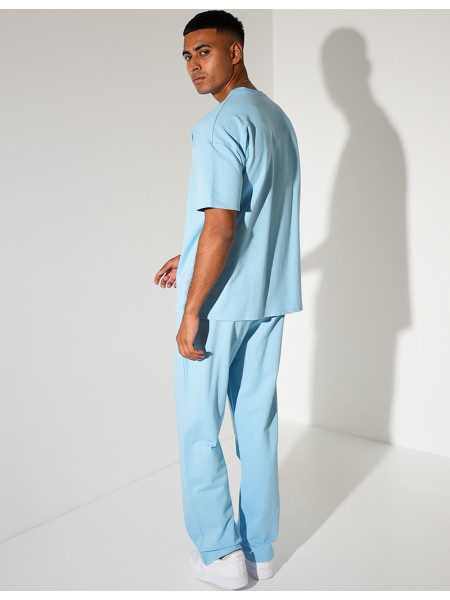 Ensemble uni pantalon à bande et t-shirt