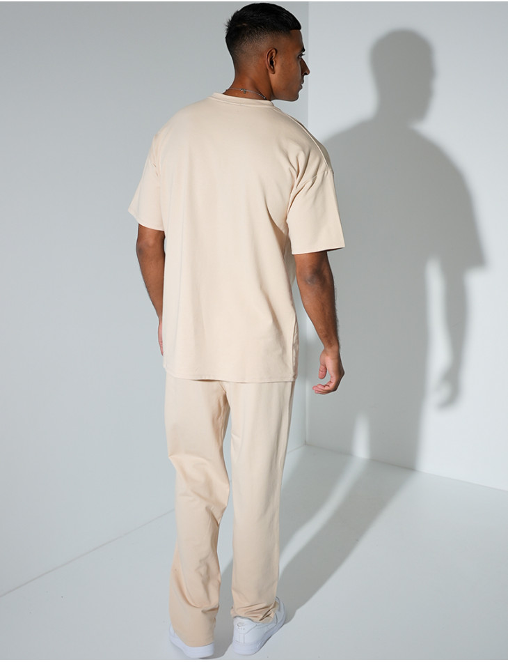 Ensemble uni pantalon à bande et t-shirt