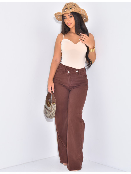 Brown straight-leg jeans with asymmetric buttonhole