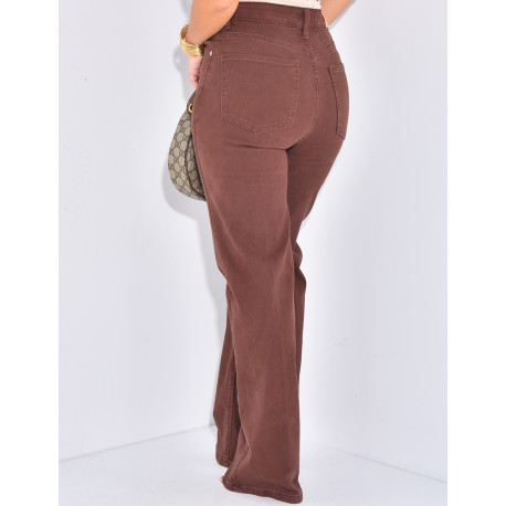 Brown straight-leg jeans with asymmetric buttonhole