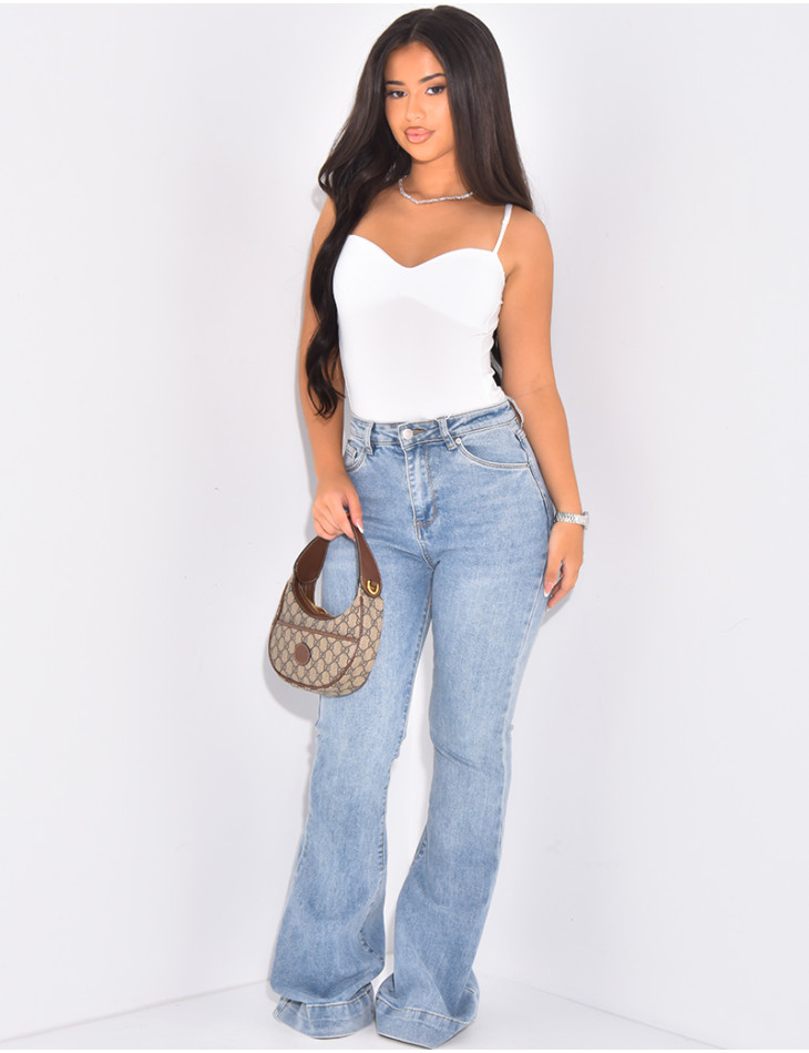 High-waisted faded blue flare jeans