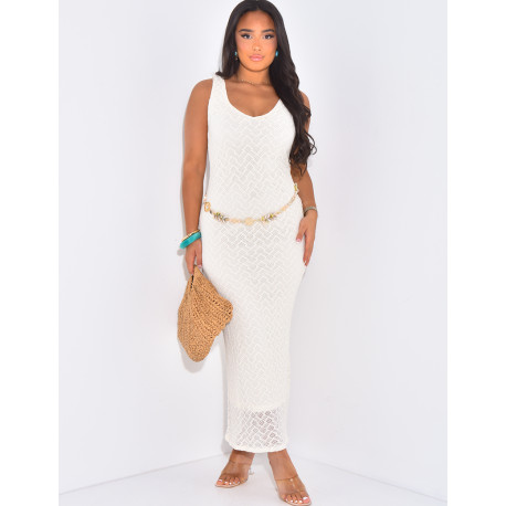 Langes, ärmelloses Kleid aus gefütterter Spitze.