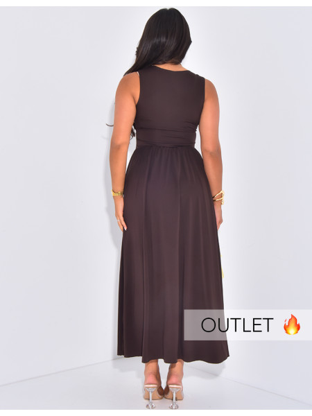 Long sleeveless dress with a puffy effect at the hips