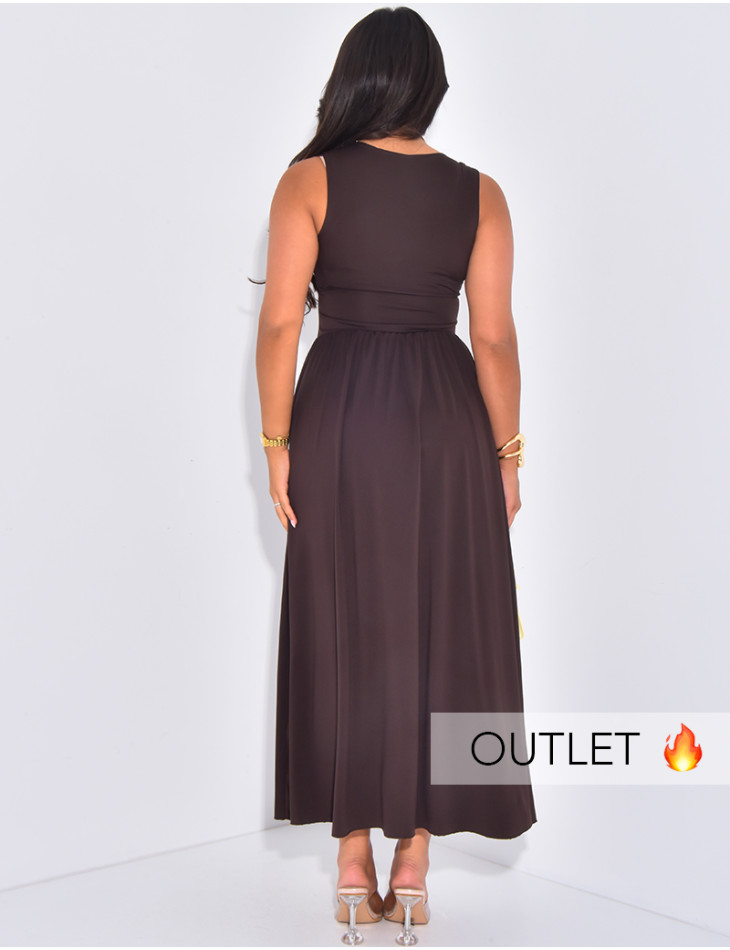 Long sleeveless dress with a puffy effect at the hips