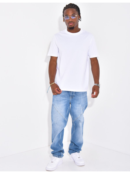 Jeans destroy à coutures contrastantes