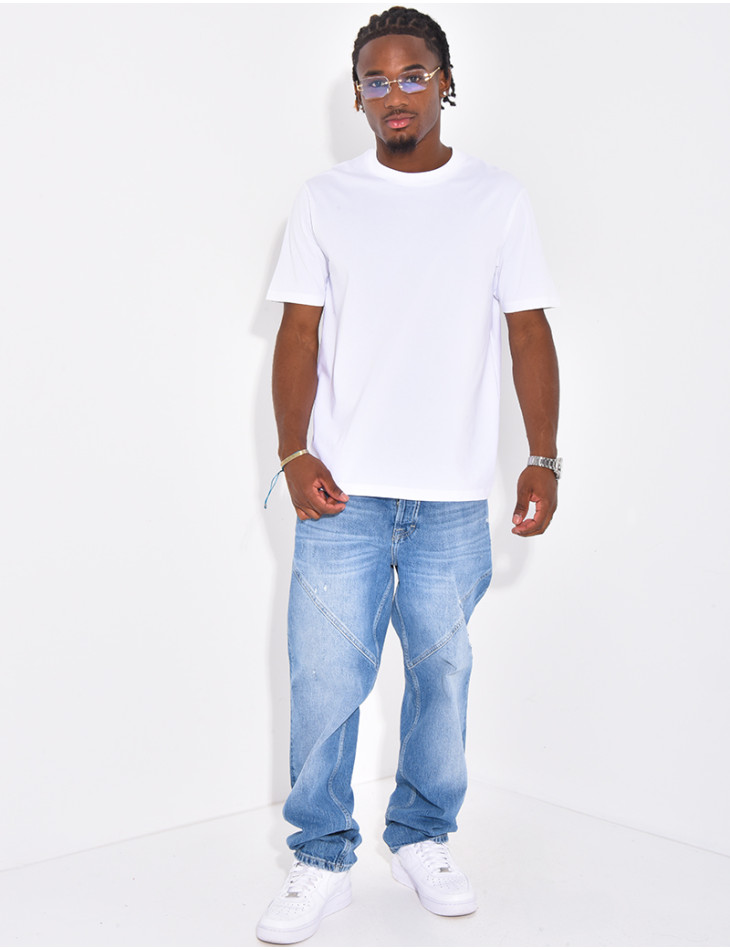 Jeans destroy à coutures contrastantes