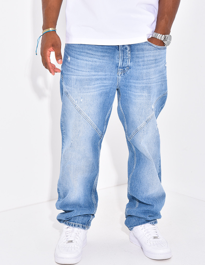 Jeans destroy à coutures...