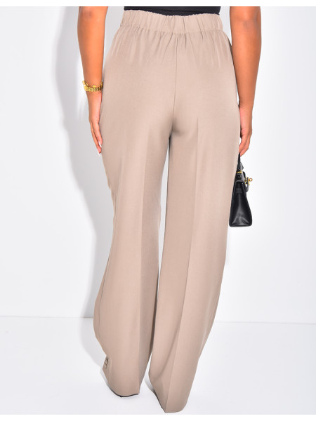 Pantalon de tailleur à boutons aux chevilles
