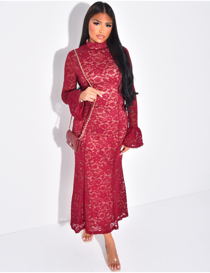 Long, form-fitting lace dress with high neck