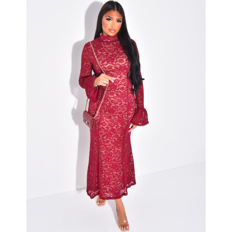 Long, form-fitting lace dress with high neck