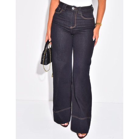 Jeans coupe large stretchy avec revers