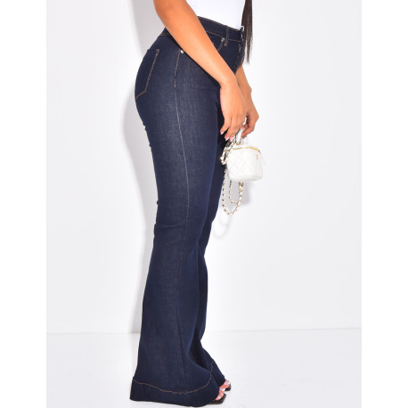 High-waisted raw blue flare jeans