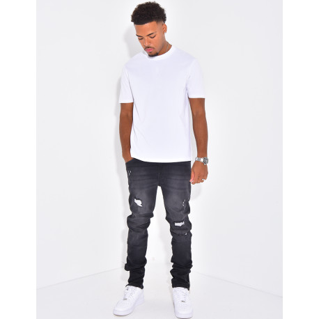 Jeans à fermeture éclaire et tâches