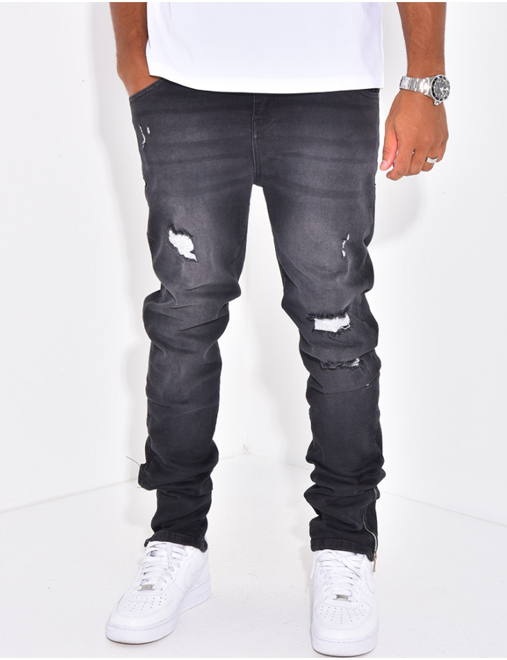Jeans à fermeture éclaire et tâches