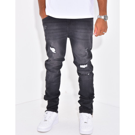Jeans à fermeture éclaire et tâches