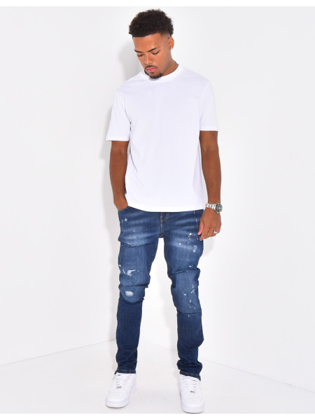 Jeans à fermeture éclaire et tâches