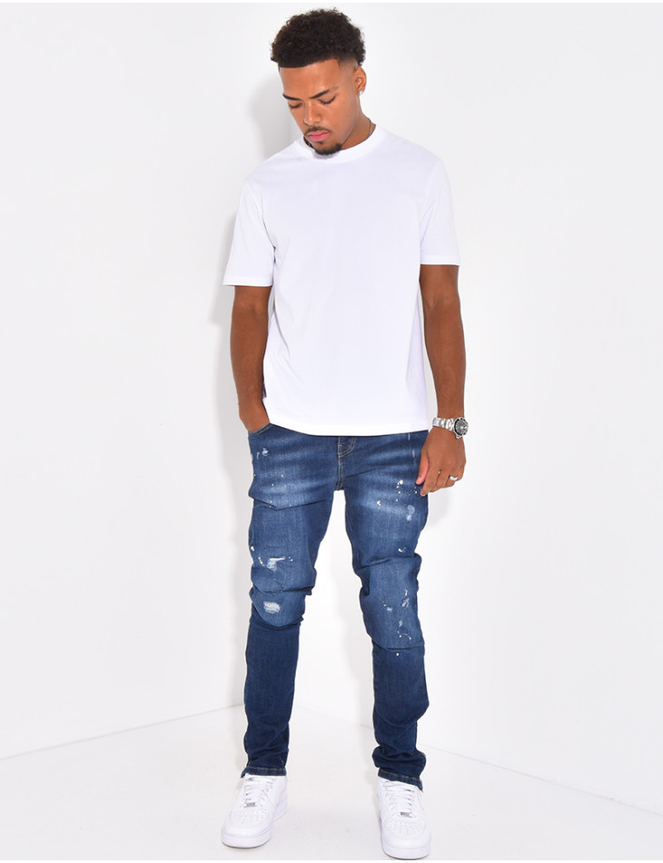 Jeans à fermeture éclaire et tâches