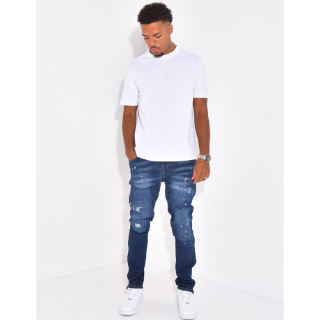 Jeans à fermeture éclaire et tâches