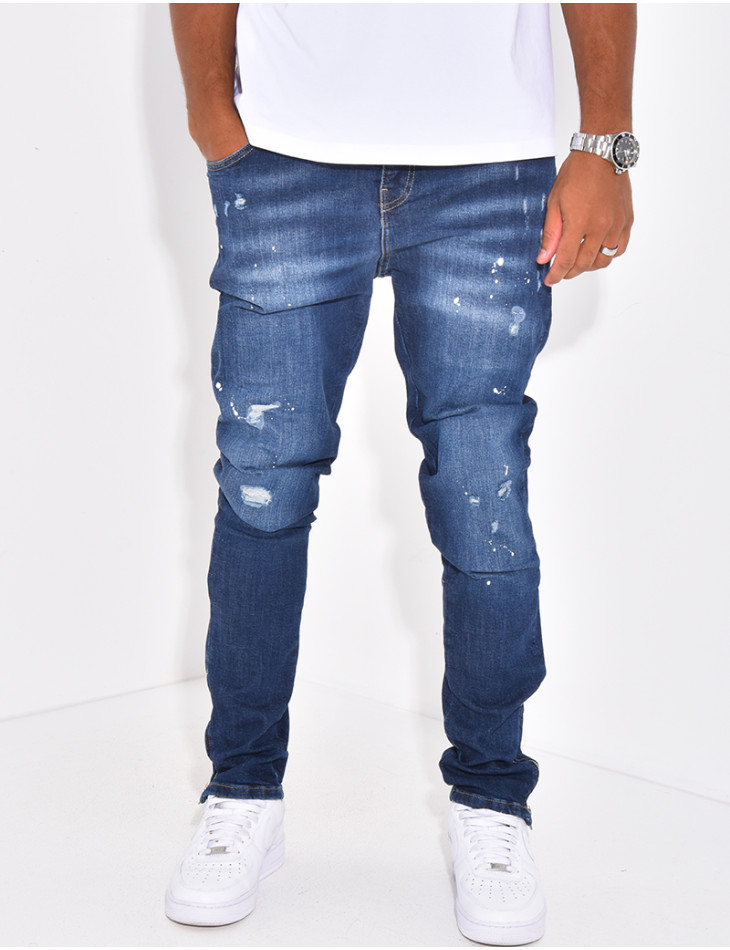 Jeans à fermeture éclaire et tâches