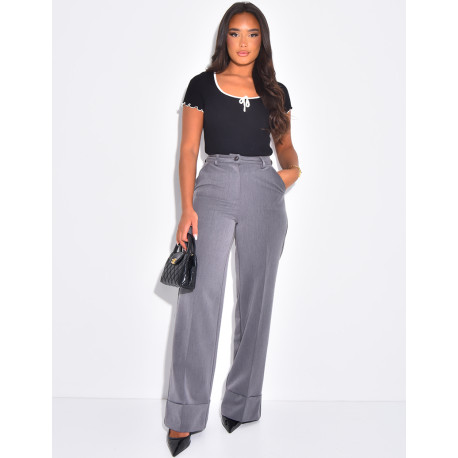 High-waisted tailored trousers with turn-ups