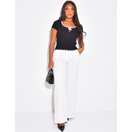 High-waisted tailored trousers with turn-ups