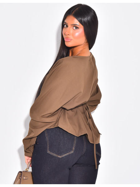 Long-sleeved blouse, fitted at the waist with a bow at the back