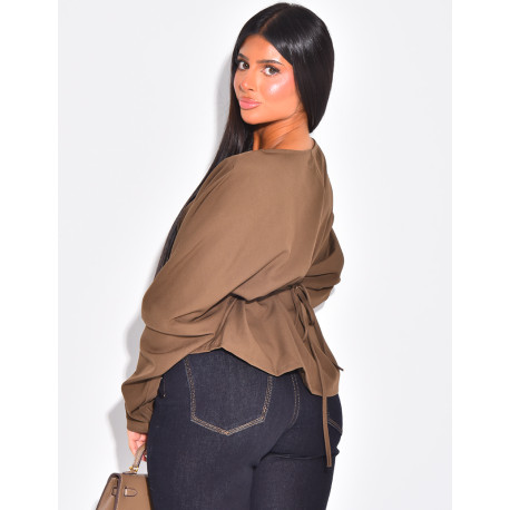 Long-sleeved blouse, fitted at the waist with a bow at the back