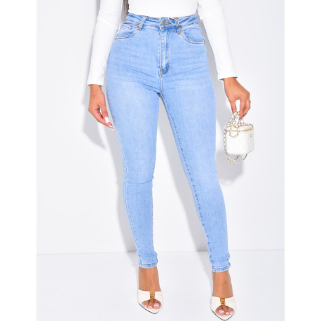 High-waisted stretchy faded skinny jeans