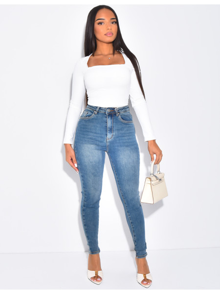 High-waisted stretchy faded skinny jeans