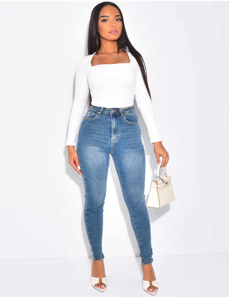 High-waisted stretchy faded skinny jeans