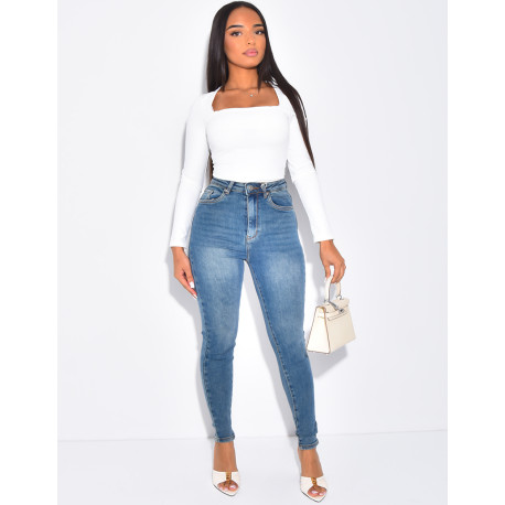 High-waisted stretchy faded skinny jeans