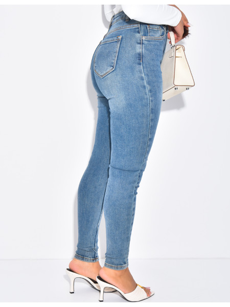 High-waisted stretchy faded skinny jeans