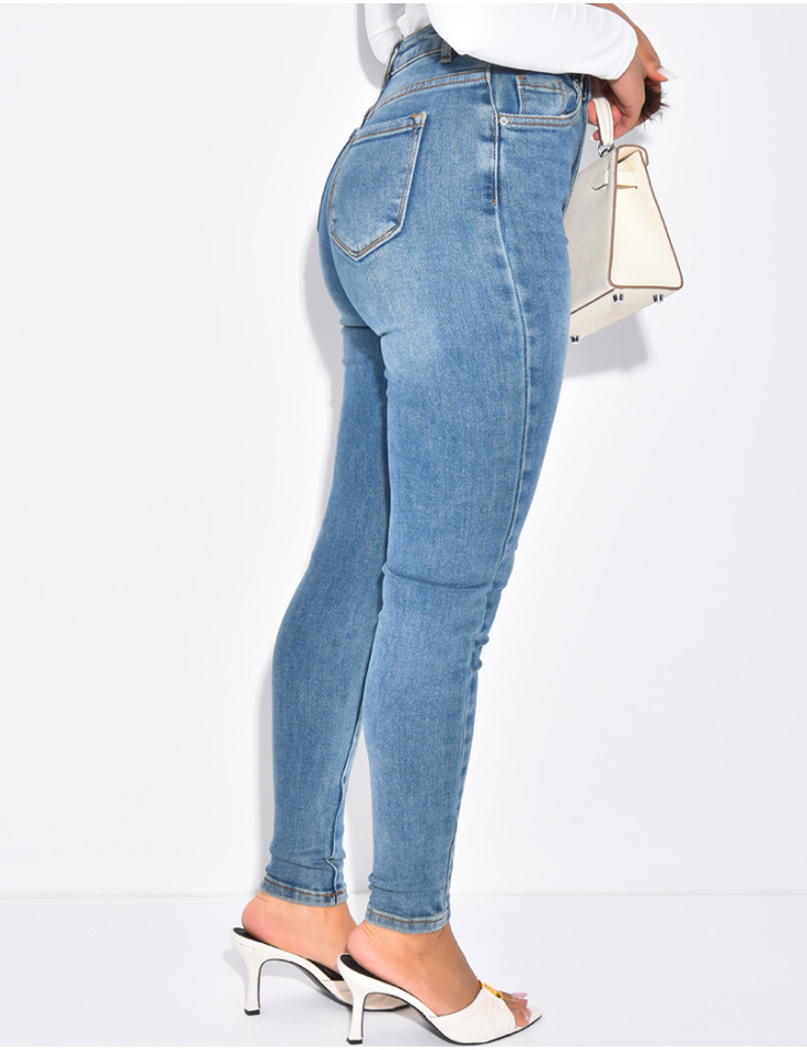 High-waisted stretchy faded skinny jeans