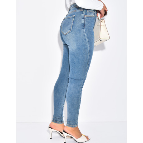 High-waisted stretchy faded skinny jeans