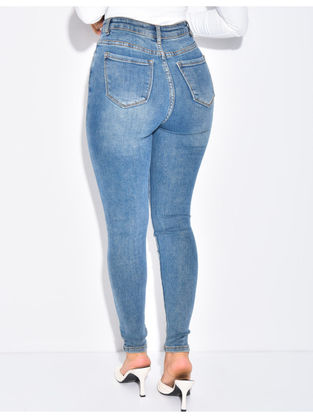 High-waisted stretchy faded skinny jeans