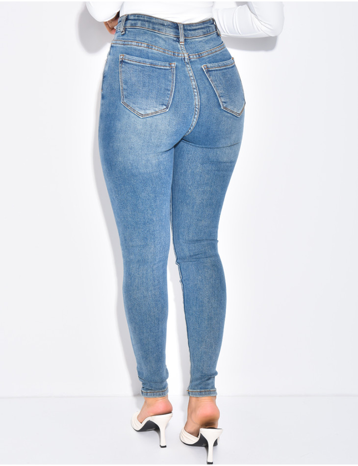 High-waisted stretchy faded skinny jeans