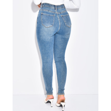 High-waisted stretchy faded skinny jeans