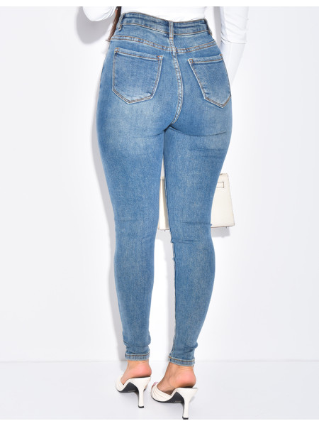 High-waisted stretchy faded skinny jeans