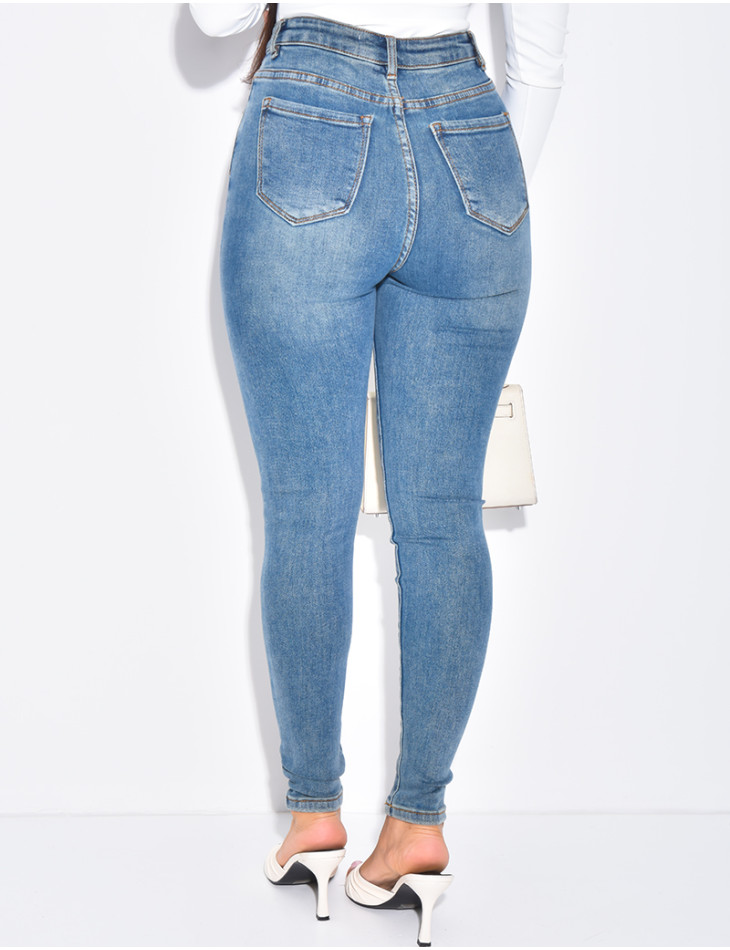 High-waisted stretchy faded skinny jeans