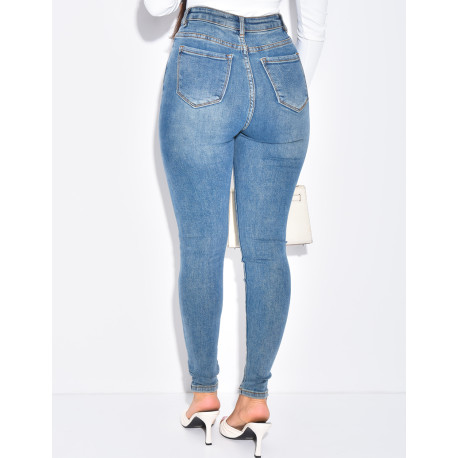 High-waisted stretchy faded skinny jeans