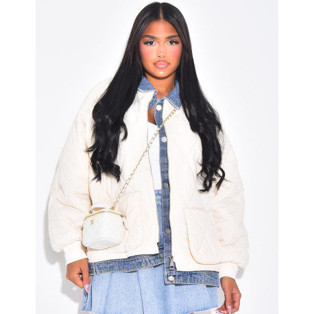 Veste matelassée à empiècements jeans et surpiqures