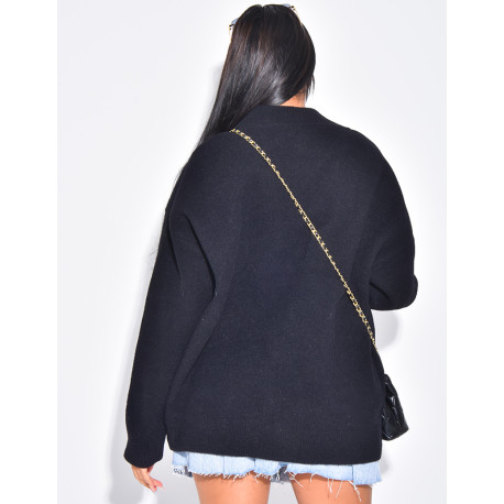 Wool cardigan with denim inserts on the pockets