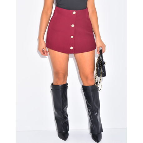 Jupe short taille haute à boutons dorés