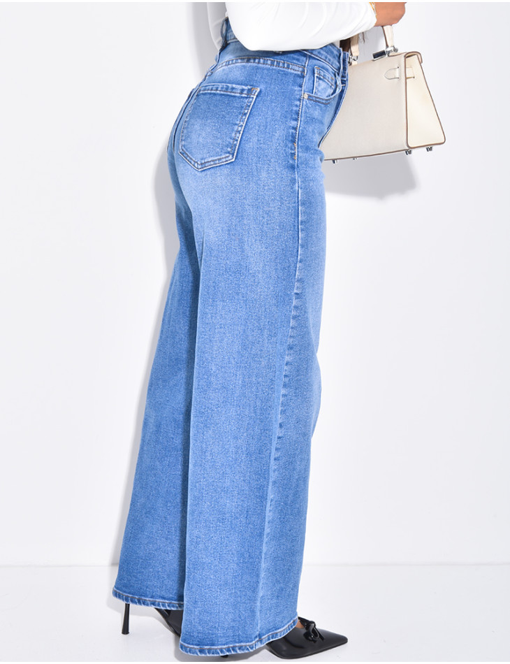 Jeans coupe ballon bleu délavé en tissu stretch