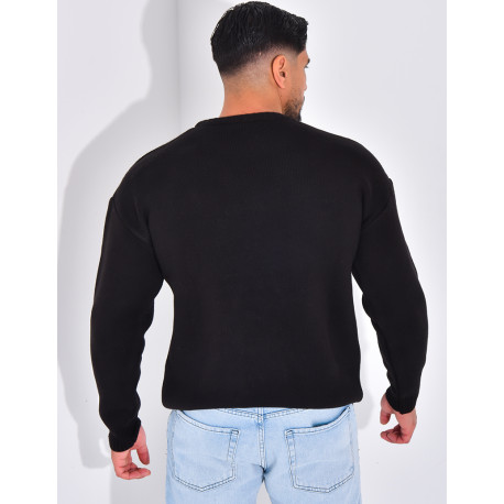 Pull épais avec la lettre H