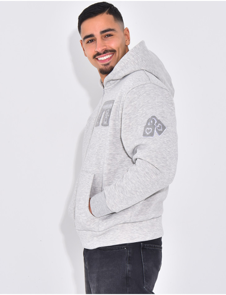 Veste à capuche avec arc de triomphe