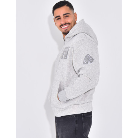 Veste à capuche avec arc de triomphe