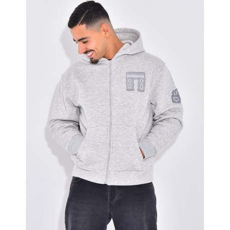 Veste à capuche avec arc de triomphe