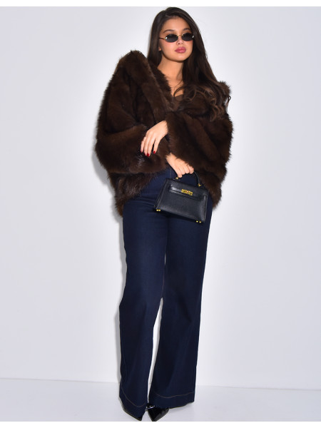 Veste oversize en fausse fourrure à capuche